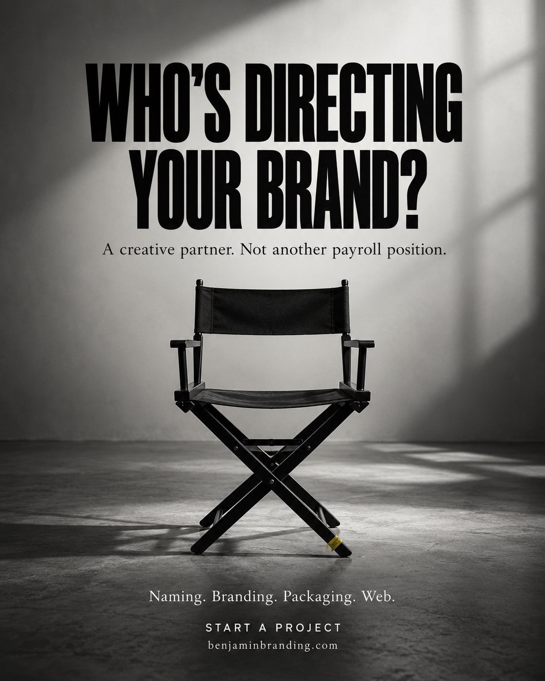 A black director chair in a softly lit studio. Benjamin Branding creative: Who’s directing your brand?