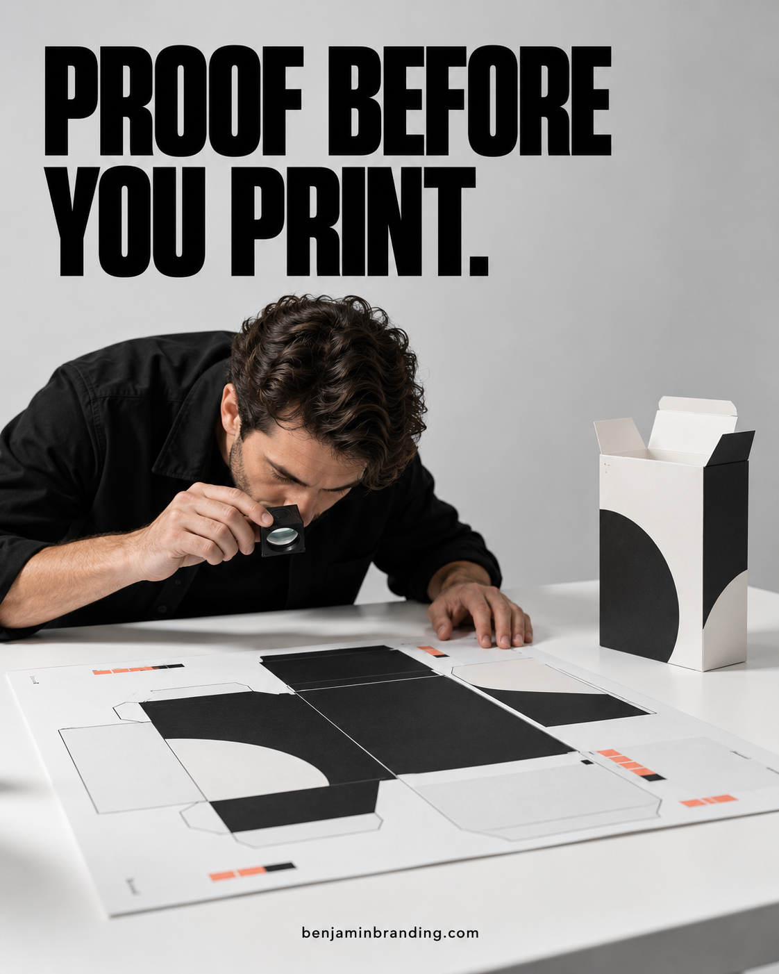 Designer inspecting an oversized carton proof beside a folded package beneath Proof before you print.